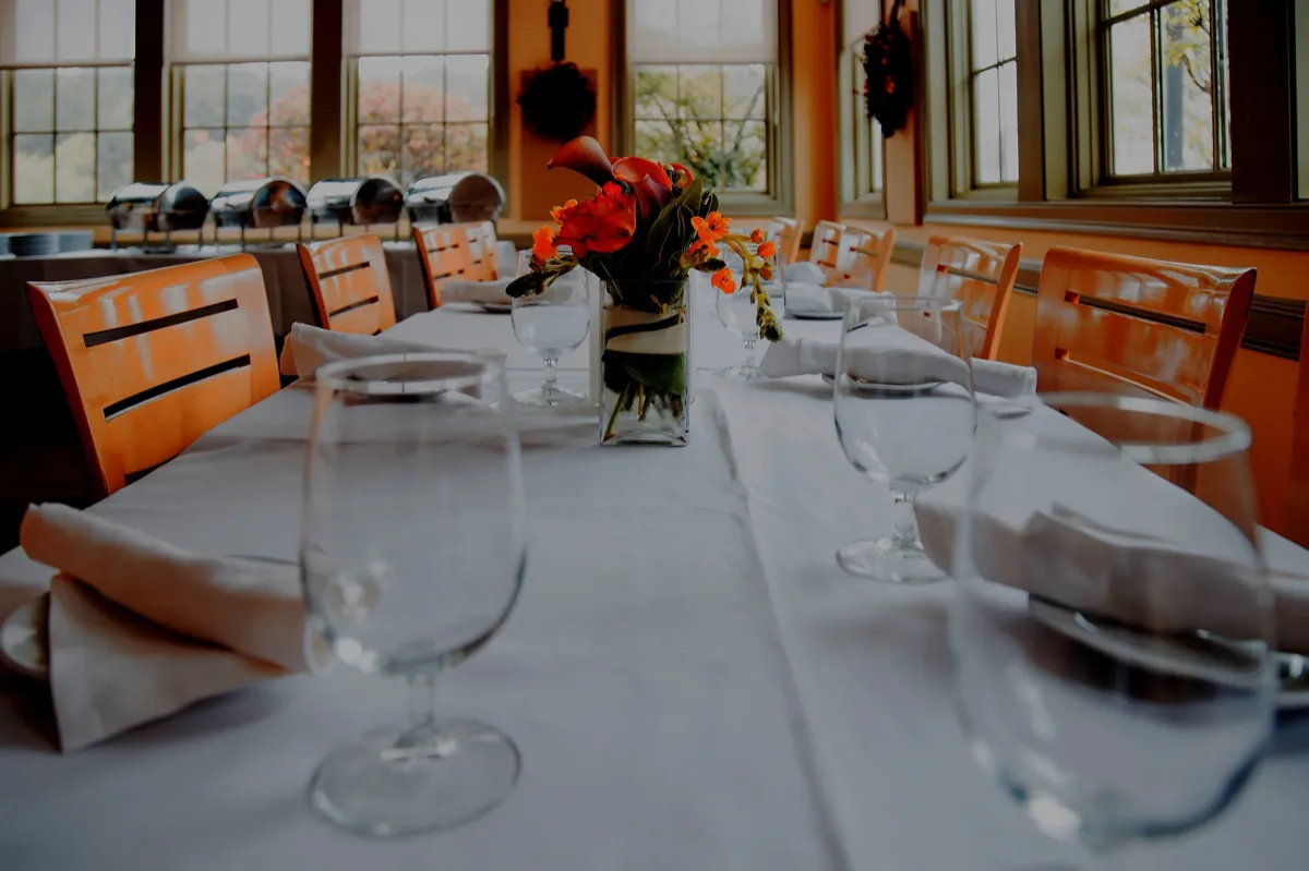 Long banquet table set for a private party at Siena